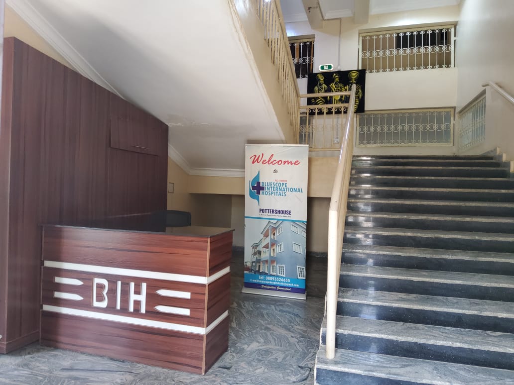 BIH reception with welcome banner and stairwell